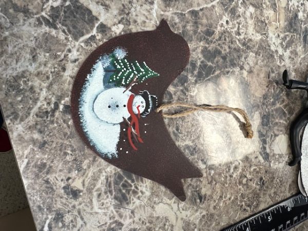 Rustic Snowman on a Metal Bird