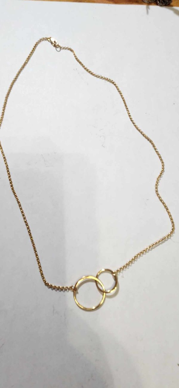 Gold Tone Anavia Interlocking Karma Circle Necklace - Image 2