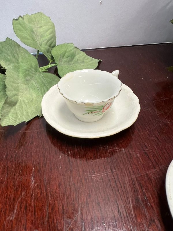 Tea Cup &* Saucers